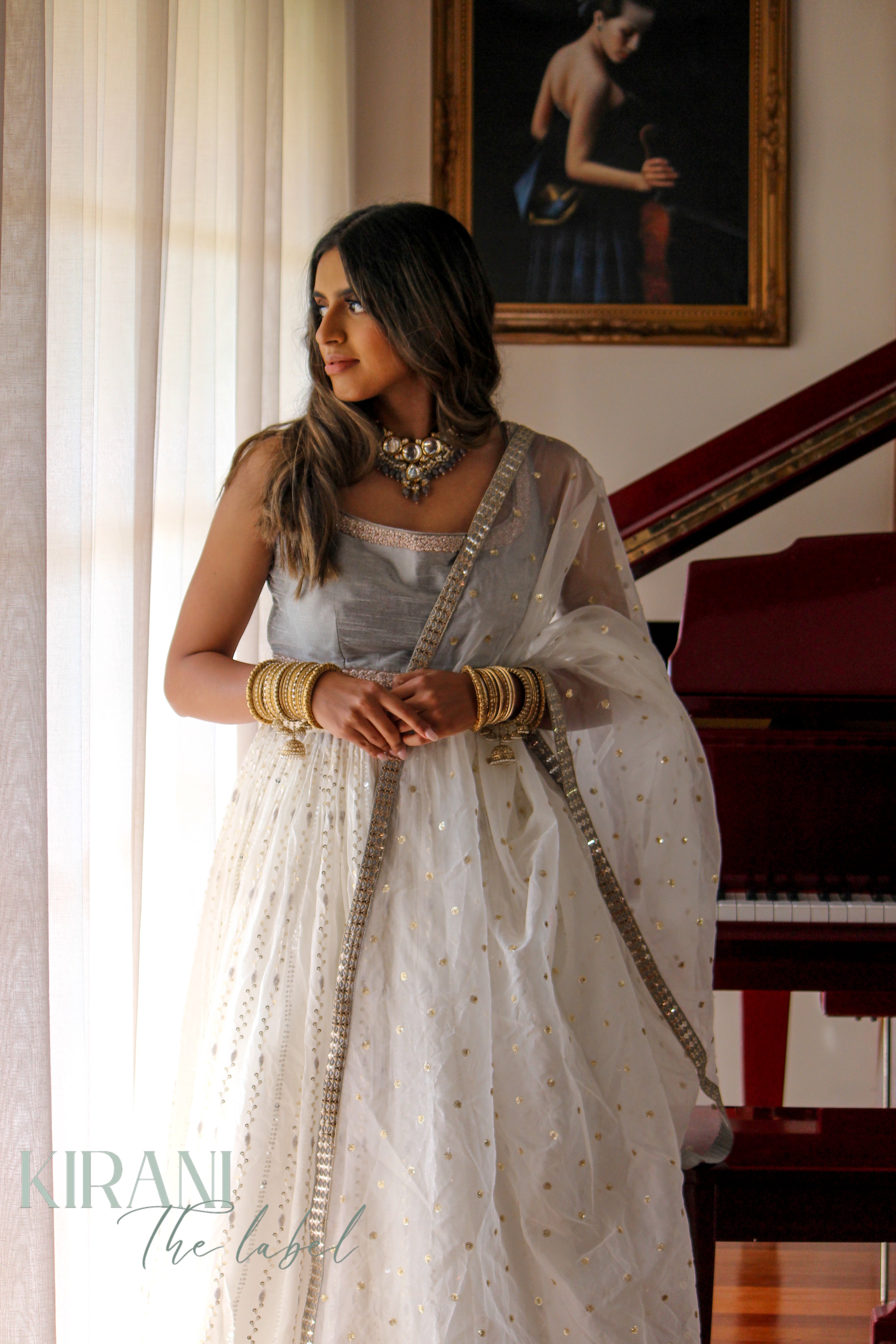 White Lucknowi Chikankari Lehenga with grey blouse