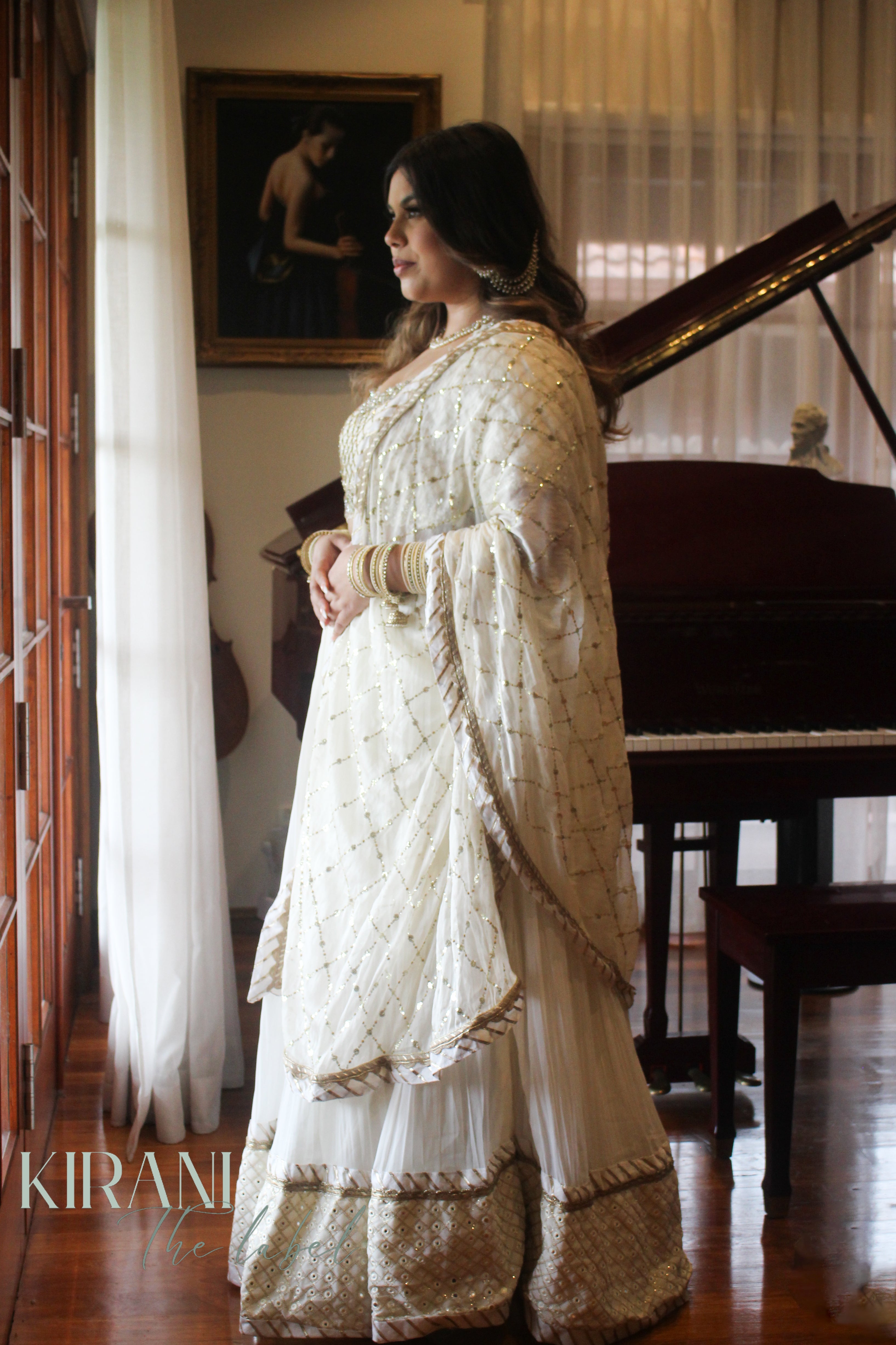 Pari - White lehenga with mirror-work blouse